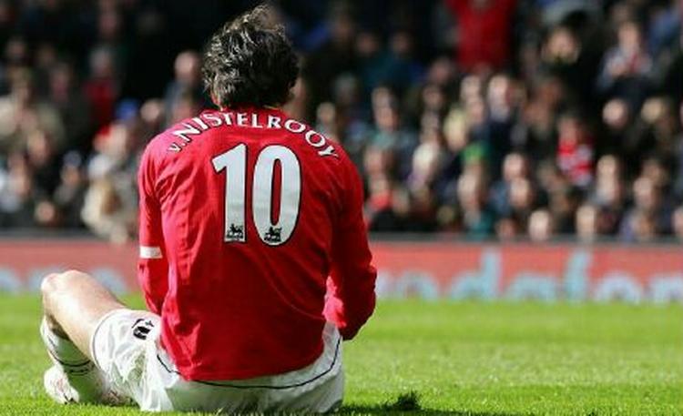 Manager Ferguson mener, at Ruud van Nistelrooy har vendt holdet ryggen. - Arkivfoto. AP. 