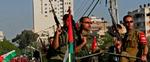 Medlemmer af den ny Hamas-styrke viser muskler i gaderne i Gaza By. - Foto: AP 