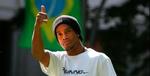Ronaldinho håber inderligt, at Wayne Rooney kommer til at spille en rolle ved VM. - Foto: AP. 