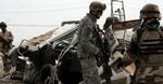 Amerikanske og irakiske soldater på patrulje sammen. De irakiske soldater er ikke klar til at løfte opgaven alene, mener militær tænketank. - Foto: AP 