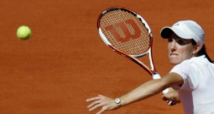 Belgiske Justin Henin-Hardenne vandt French Open uden at afgive ét enkelt sæt. I finalen gik det ud over russeren Svetlana Kuznetsova. - Foto: AP 