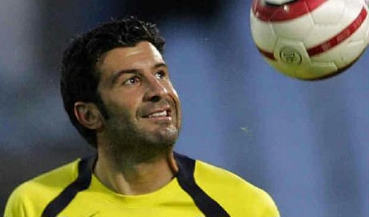 Portugals Louis Figo er bedre end nogensinde. I aften møder holdet Iran - Foto: AP 