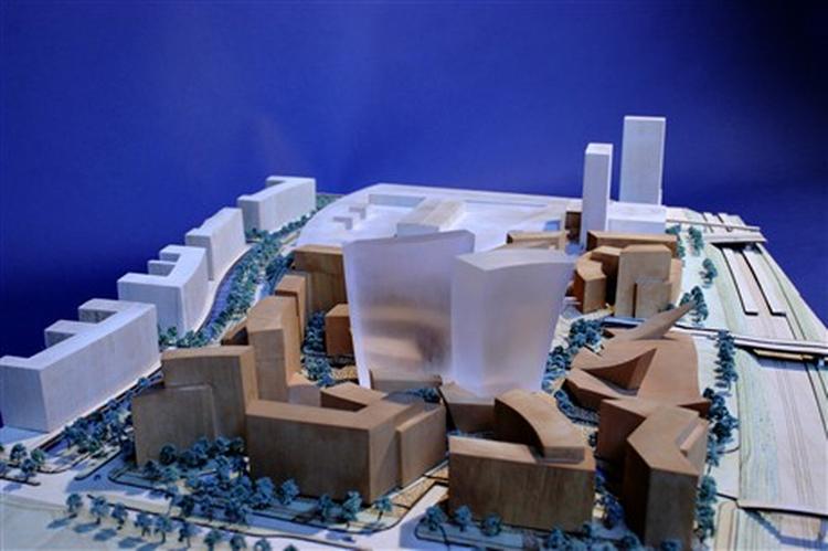 To skruede kontortårne fylder godt op, både til lands og i luften, i Daniel Libeskinds plan over området ved indkøbscentret Field s (som ses i baggrunden).   Illustration: Studio Daniel Libeskind 
