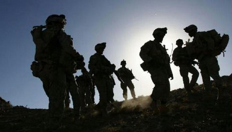 Amerikanske soldater er på patrulje i Helnand provinsen i Afghanistan, hvor Taleban igen er blevet aktive. - Foto: AP 