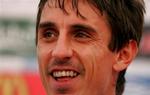 Gary Neville kan smile igen og forventes klar til kvartfinalen mod Portugal. - Foto: AP. 