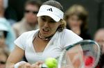 Martina Hingis vendte tilbage til Wimbledons græsunderlag med en sejr i første runde. - Foto: AP 