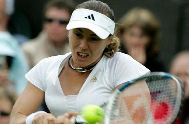 Martina Hingis vendte tilbage til Wimbledons græsunderlag med en sejr i første runde. - Foto: AP 