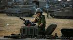 De israelske kampvogne rumler uden for Gaza sent i dag. Og en bro er blevet angrebet. - Foto: AP 