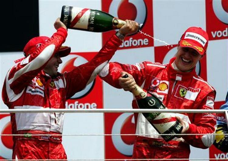 Michael Schumacher og Felipe Massa. - Foto: AP 