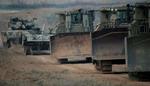 Armerede bulldozere rykkede tidligt i dag ind i det nordlige Gaza. Eftersøgningen af den tilfangetagne israelske soldat fortsætter, og Israel får nu støtte fra Rusland. - Foto: AO 