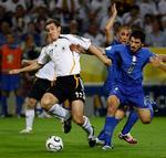 Tyskland og Klose blev den lille i duellen med Italien og Gattuso. - Foto: AP. 