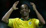 Ronaldinho siger nu undskyld til sine fans for det brasilianske landshold ringe indsats ved VM - Foto: AP 
