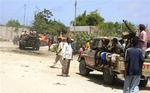 Politiet på patrulje i Mogadishu. - Foto: AP 
