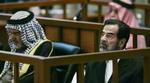 Saddam mener, det er foragteligt, at han skal tvinges i retten. - Foto: AP 