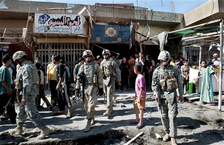 Både den irakiske regerinschef Nuri al-Maliki og USA s George Bush erkender, at forholdene i Bagdad er langt fra en situation, hvor USA kan trække sine tropper hjem. Især er religiøst betinget vold et af Iraks nye, store problemer. - Arkivfoto: AP 