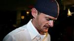 Den amerikanske cykelrytter Floyd Landis mødte op til pressemødet i Spanien med omvendt kasket. Amerikaneren nægter at have deltaget i en doping-proces i Tour de France. - Arkivfoto: AP 