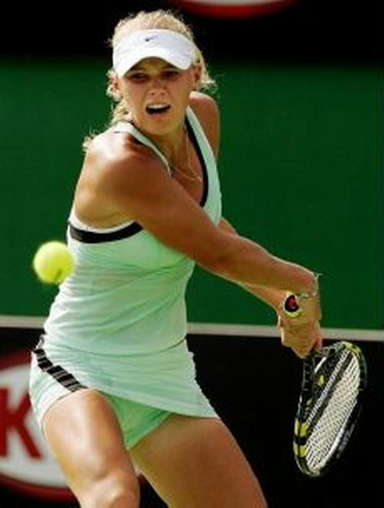 I næste runde skal Caroline Wozniacki op mod kinesiske Jie Zheng. - Foto: AP 