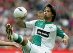 Bremens nye midtbanegeneral, brasilianeren Diego, bragte mesterskabsaspiranterne foran med 1-0. - Foto: AP. 