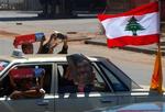Hassan Nasrallahs tale blev med jubel flere steder i Beirut. - Foto: AP 