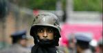 En regeringssoldat holder vagt i Sri Lankas hovedstad Colombo. - Foto: AP 