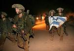 Israelske specialstyrker vender hjem efter en operation i Sydlibanon. - Foto: AP 