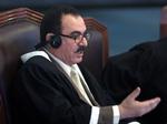 Chefdommer Abdullah al-Amiri har ytret sig positivt i forhold til Saddam Hussein. 