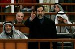 Saddam-sag er under pres, advarer Human Rights Watch. 