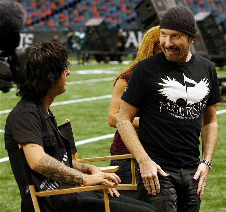 Billie Joe Armstrong, forsanger i Green Day, og U2's The Edge inden koncerten i Superdome. 