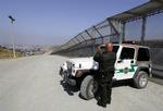Sikkerhedsvagter langs grænsen mellem San Diego, USA, og Tijuana, Mexico. 