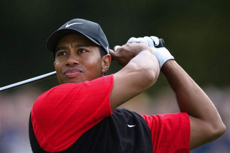 Med en score på 23 slag under par blev Tiger Woods en suveræn vinder af WGC-turneringen American Express Championship. 