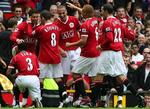 United-spillerne jubler over Ronaldos scoring. - Foto: AP. 
