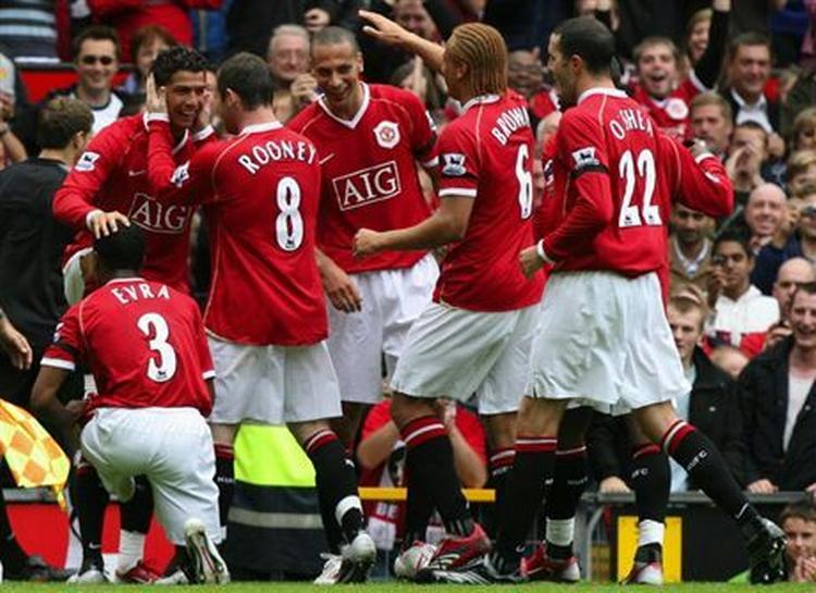 United-spillerne jubler over Ronaldos scoring. - Foto: AP. 