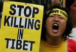 Kinas tilstedeværelse i Tibet har tidligere givet anledning til protester. Dette billede er fra en demonstration i London i september. 