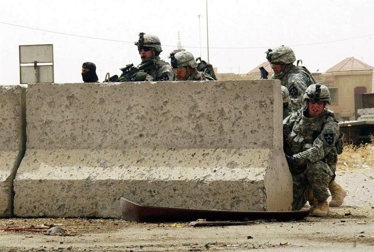 Volden stiger i den irakiske by Mosul. 