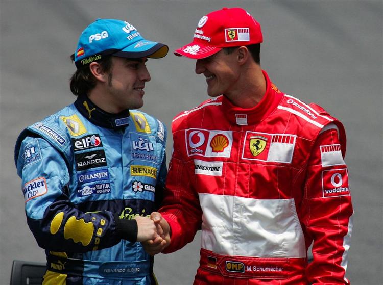 Schumacher (th) og Alonso inden løbet i Brasilien. 