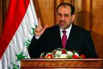 Irak og USA er enige om at lave en tidsplan for fremskridt i Irak. 