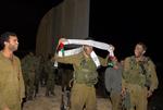 Israelske soldater i godt humør i forbindelse med tilbagetrækningen fra Gaza. 