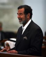 Saddam Husseins humør er løftet, selvom han i weekenden blev dømt til døden. 