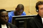 Thomas Lubanga ved ICC i Haag (yderst til venstre) 