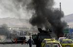 NATO styrkerne i det sydlige Afghanistan har lovet stabilitet gennem udvikling. Her er det fra et selvmordsangreb på en NATO-konvoj midt i oktober. 