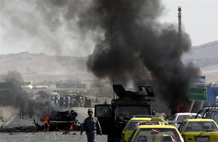 NATO styrkerne i det sydlige Afghanistan har lovet stabilitet gennem udvikling. Her er det fra et selvmordsangreb på en NATO-konvoj midt i oktober. 