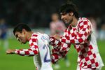 Vedran Corluka (th.) formåede imodsætning til de israelske forsvare at fange Eduardo da Silva, der scorede tre gange i Tel Aviv. 