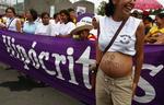 Der var demonstrationer i Nicaraguas hovedstad Managua i oktober mod den nye abortlov. Den gravide kvinde har skrevet 'Jeg valgte' på maven. 