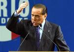 Karismatiske Berlusconi nåede to perioder som italiensk ministerpræsident. 