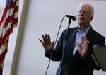 Den tidligere præsident Jimmy Carter spår, at beslutningen om at invadere Irak vil gå over i historien som en gigantisk fejltagelse. 