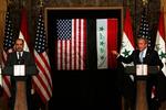 Sikkerhedsansvaret skal hurtigt overdrages til irakerne, mener præsident Bush og den irakiske premierminister Nuhri al-Maliki. 