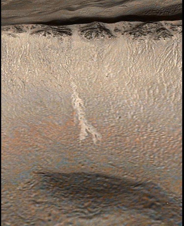 Nye tegn på vand på Mars styrker troen på, at der kan findes liv. Foto: AP 