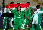 Samer Mujbel jubler over Iraks 1-0-sejr i semifinalen over Sydkorea. 