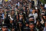 Militante palæstinensere fra al-Aqsa Martyrernes Brigade demonstrerer til fordel for præsident Abbas. 