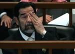 Saddam Hussein var berørt, da han modtog sin dom ved appelretten 21. december. Nu er han udleveret til irak og udførelsen af sin dødsdom. 